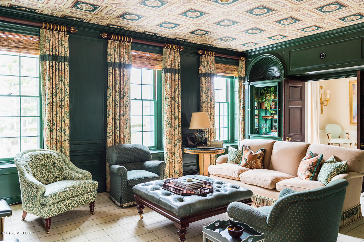 16 Rock Ridge Avenue Greenwich, CT 06831 - Photo 16 of 57 a living room with furniture and a large window