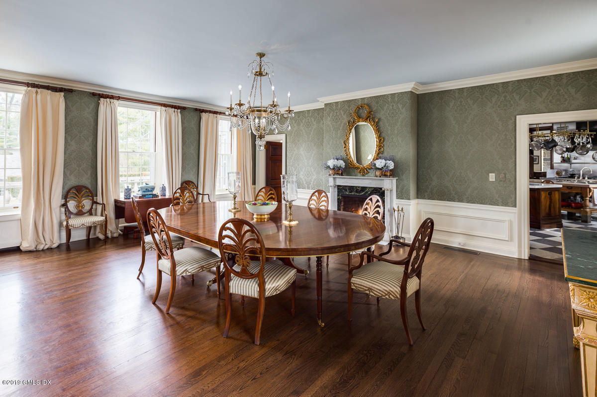 16 Rock Ridge Avenue Greenwich, CT 06831 - Photo 21 of 57 a view of a dining room with furniture window and wooden floor