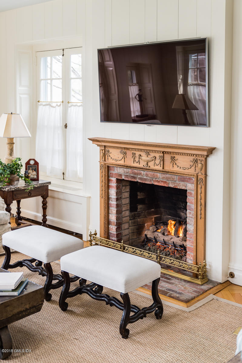 16 Rock Ridge Avenue Greenwich, CT 06831 - Photo 26 of 57 a living room with furniture