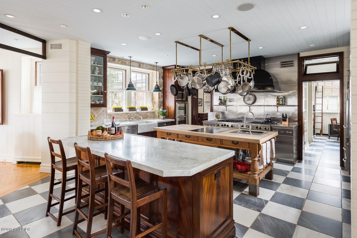 16 Rock Ridge Avenue Greenwich, CT 06831 - Photo 30 of 57 a kitchen with stainless steel appliances granite countertop a stove a sink and a refrigerator