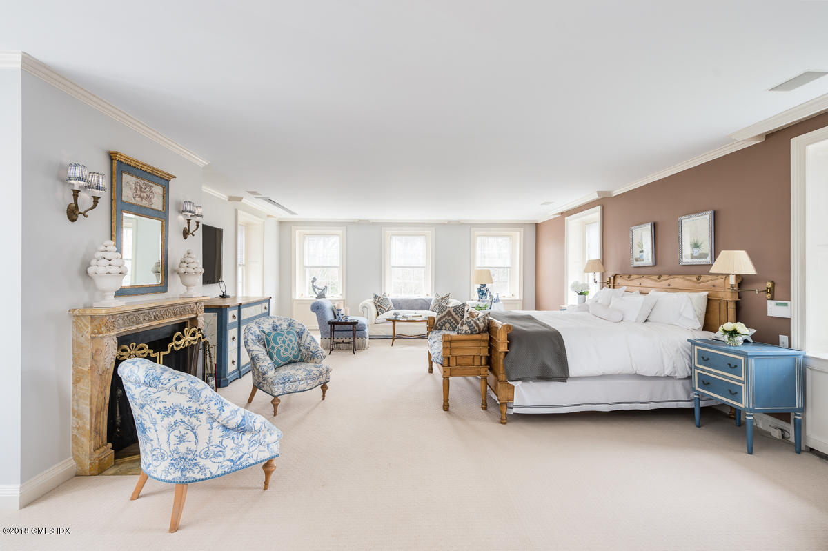 16 Rock Ridge Avenue Greenwich, CT 06831 - Photo 34 of 57 a living room with furniture and a wooden floor