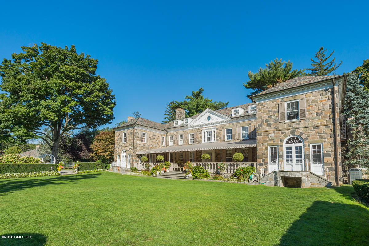 16 Rock Ridge Avenue Greenwich, CT 06831 - Photo 4 of 57 a view of a house with a garden