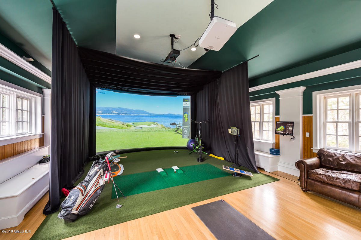 16 Rock Ridge Avenue Greenwich, CT 06831 - Photo 41 of 57 a living room with yard
