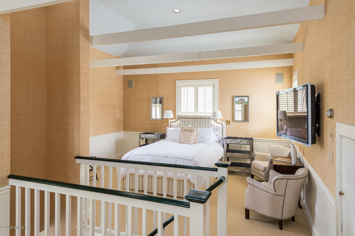 16 Rock Ridge Avenue Greenwich, CT 06831 - Photo 43 of 57 a bedroom with furniture and a window