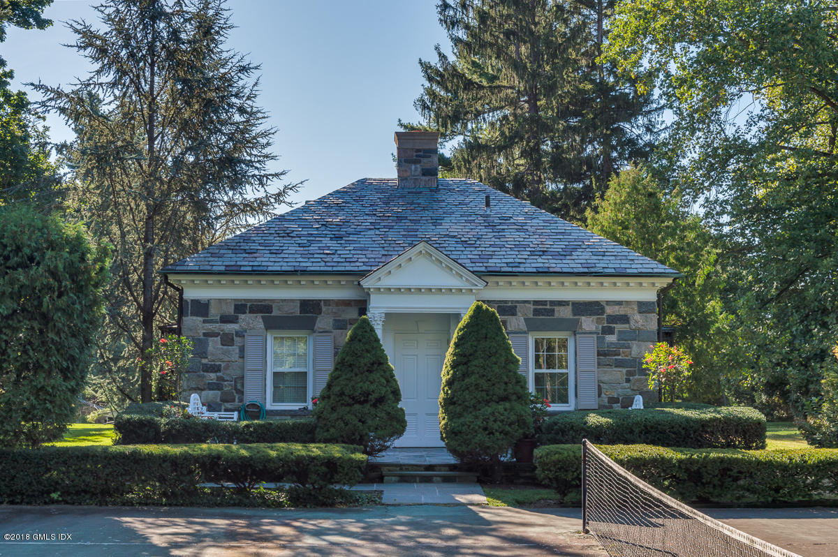 16 Rock Ridge Avenue Greenwich, CT 06831 - Photo 51 of 57 a front view of a house with garden
