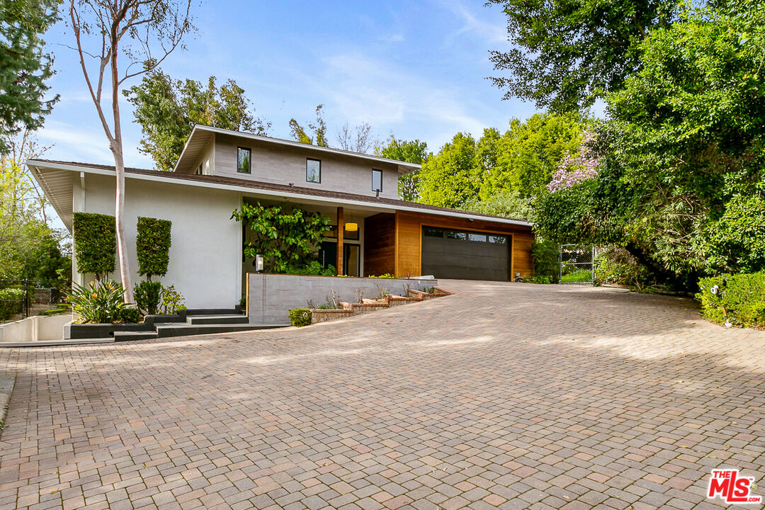 front view of a house with a street