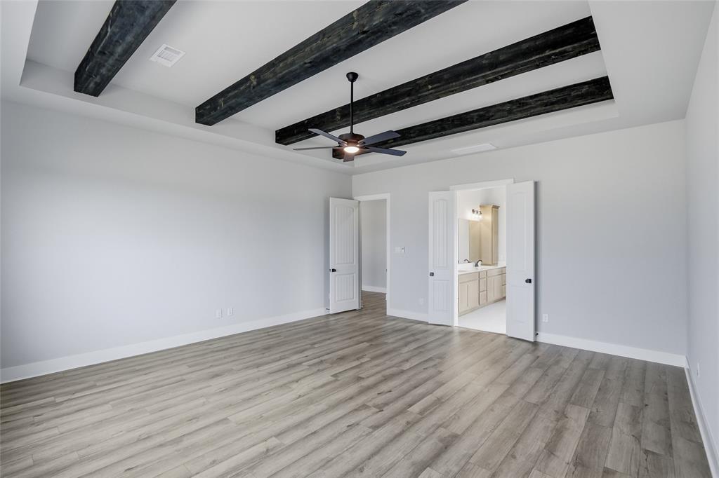 812 Vly Rdg Road Van Alstyne, TX 75495 - Photo 14 of 33 a view of a room with wooden floor
