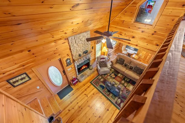 a view of a balcony with wooden floor