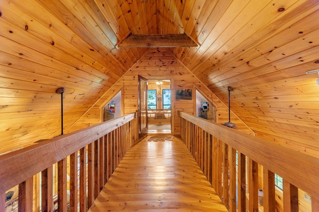 293 Broken Arrow Path Blue Ridge, GA 30513 - Photo 26 of 48 a view of a balcony with wooden floor
