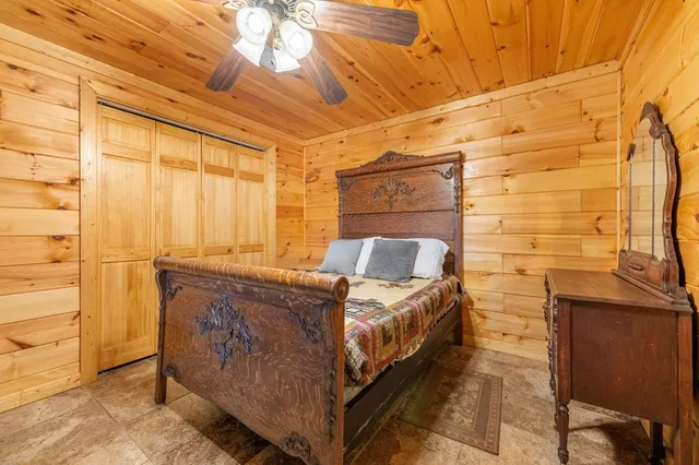 a front view of a house with outdoor seating