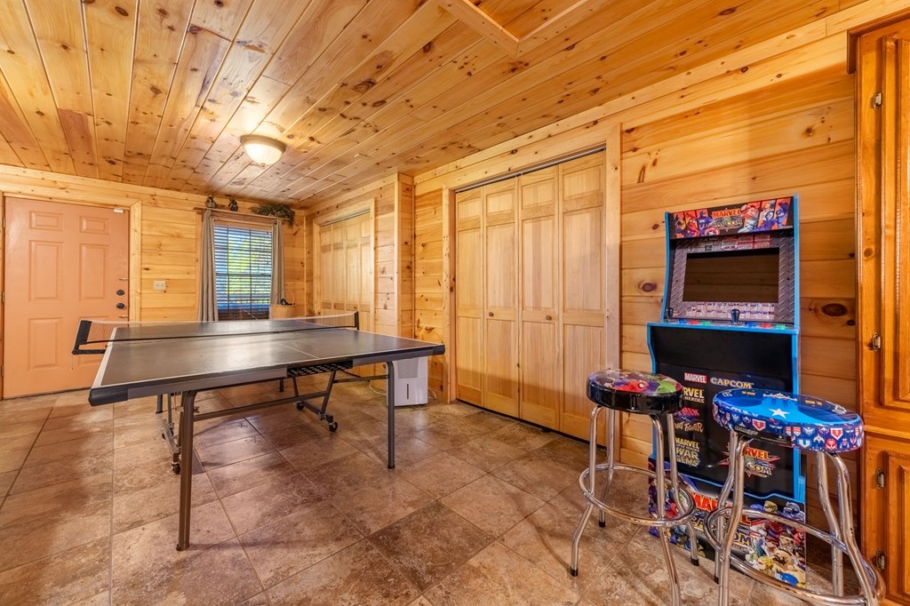 293 Broken Arrow Path Blue Ridge, GA 30513 - Photo 36 of 48 a view of a room with gym equipment