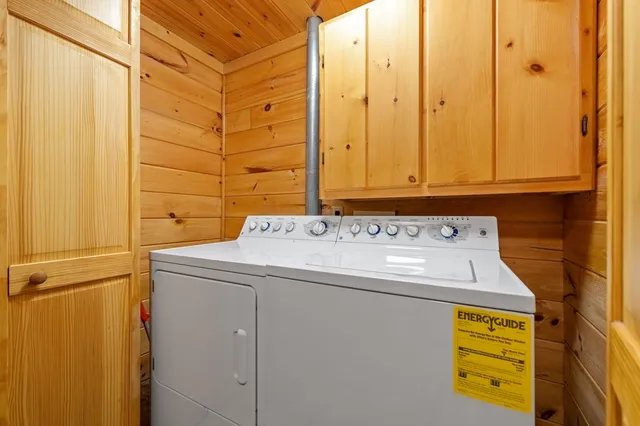 a view of a two chairs in the balcony