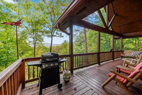 a view of balcony with wooden floor