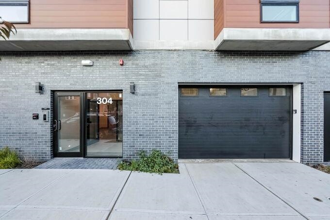 304 61st Street, Unit 3A West New York, NJ 07093 - Photo 6 of 44 a brick house with a outdoor space