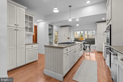 a bedroom with bed and a window