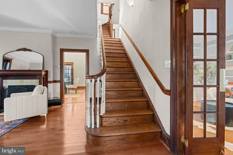 a view of a room with gym equipment and windows