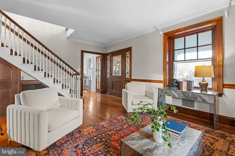 a kitchen with stainless steel appliances kitchen island granite countertop a stove and a refrigerator