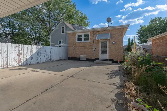 a view of a house with a street
