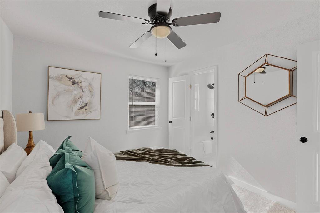 5808 Hanson Drive Watauga, TX 76148 - Photo 18 of 33 a living room with furniture and a ceiling fan