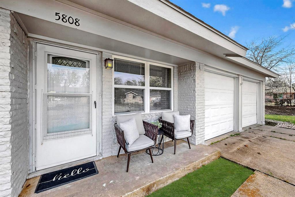 5808 Hanson Drive Watauga, TX 76148 - Photo 4 of 33 a view of a house with backyard and sitting area