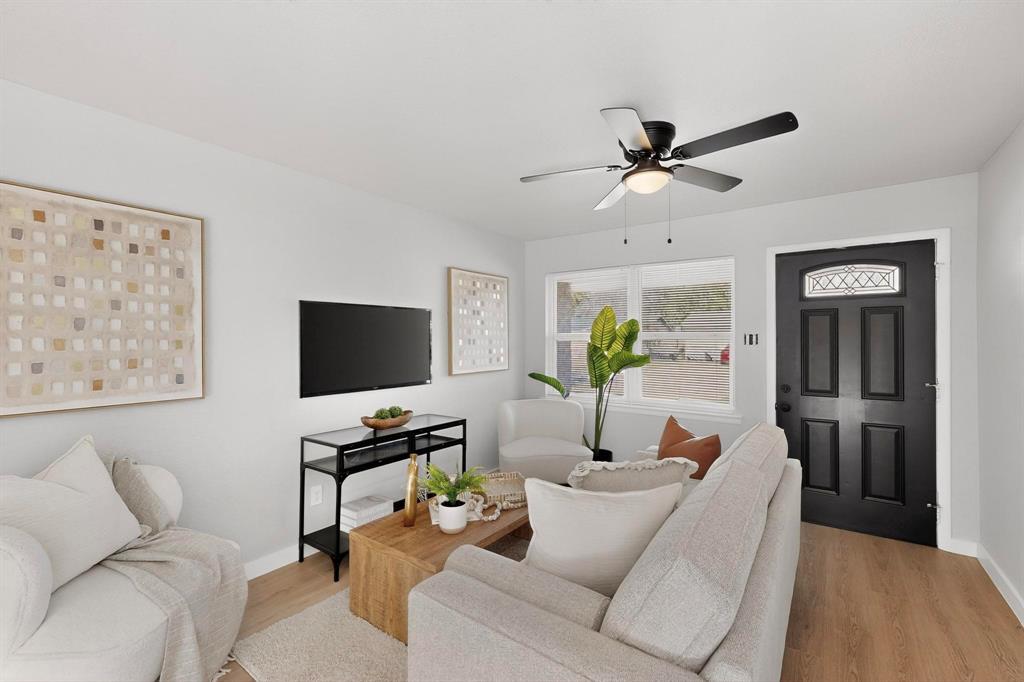 5808 Hanson Drive Watauga, TX 76148 - Photo 5 of 33 a living room with furniture and a flat screen tv