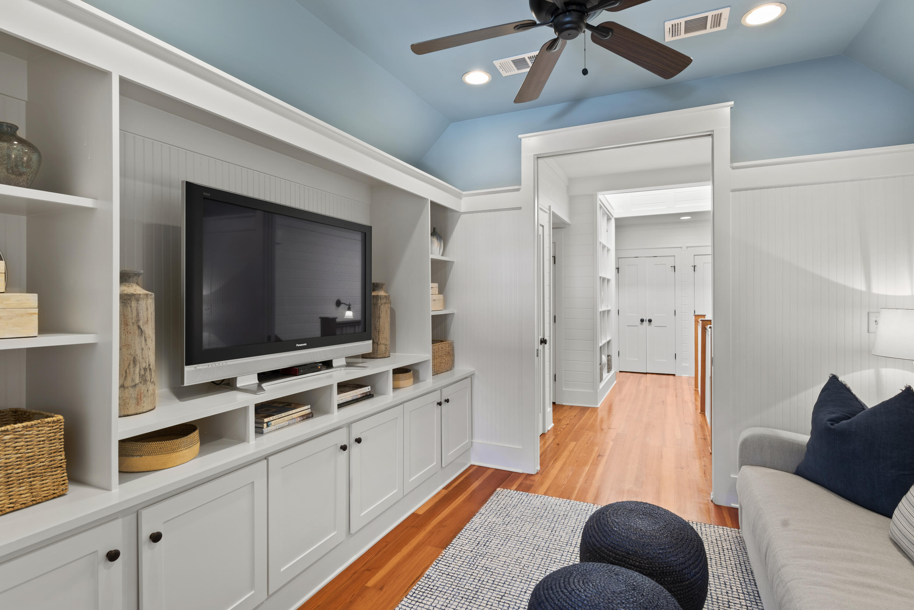 250 Needlerush Drive Santa Rosa Beach, FL 32459 - Photo 23 of 29 a living room with furniture and a flat screen tv