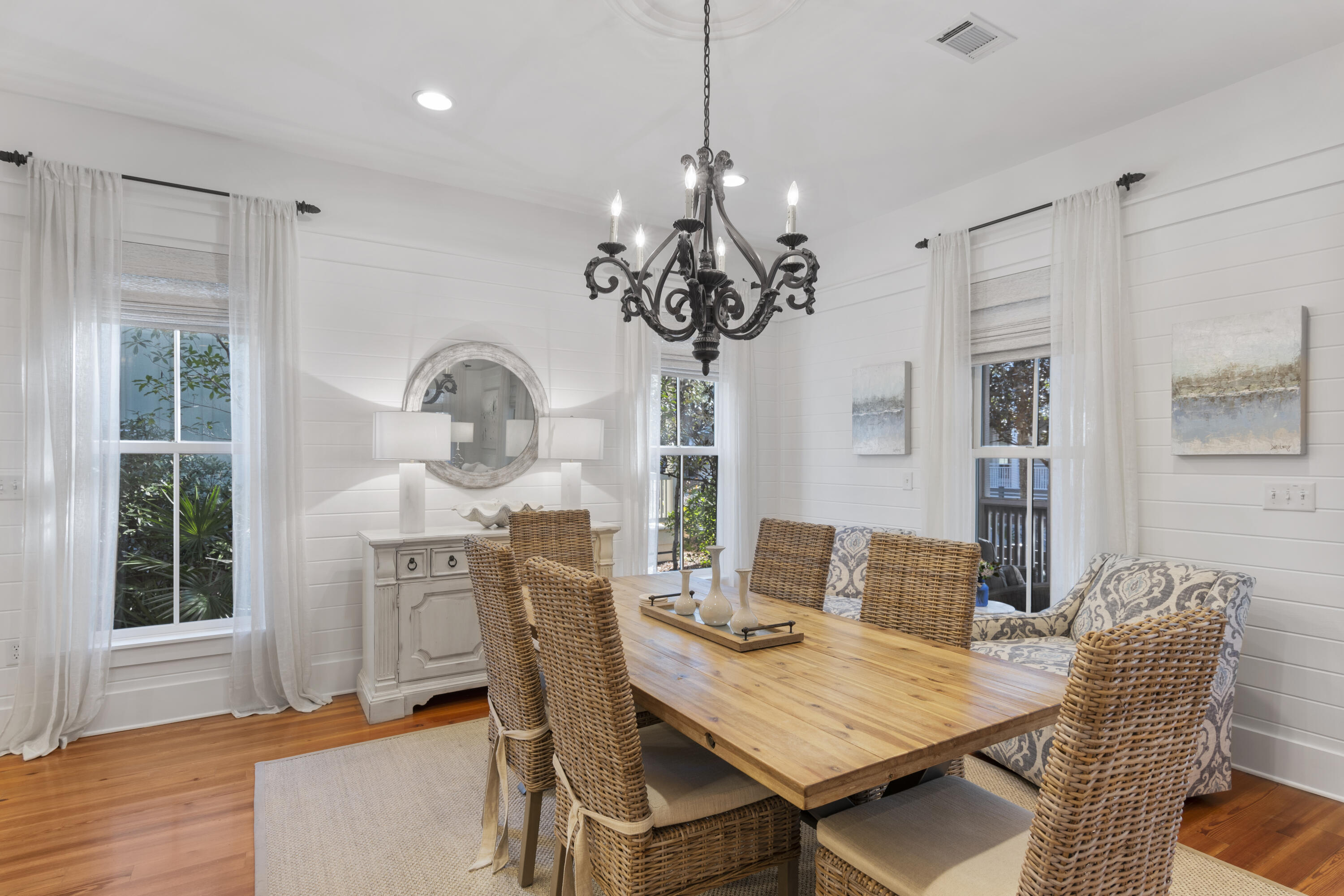 250 Needlerush Drive Santa Rosa Beach, FL 32459 - Photo 7 of 29 a view of a dining room with furniture window and wooden floor
