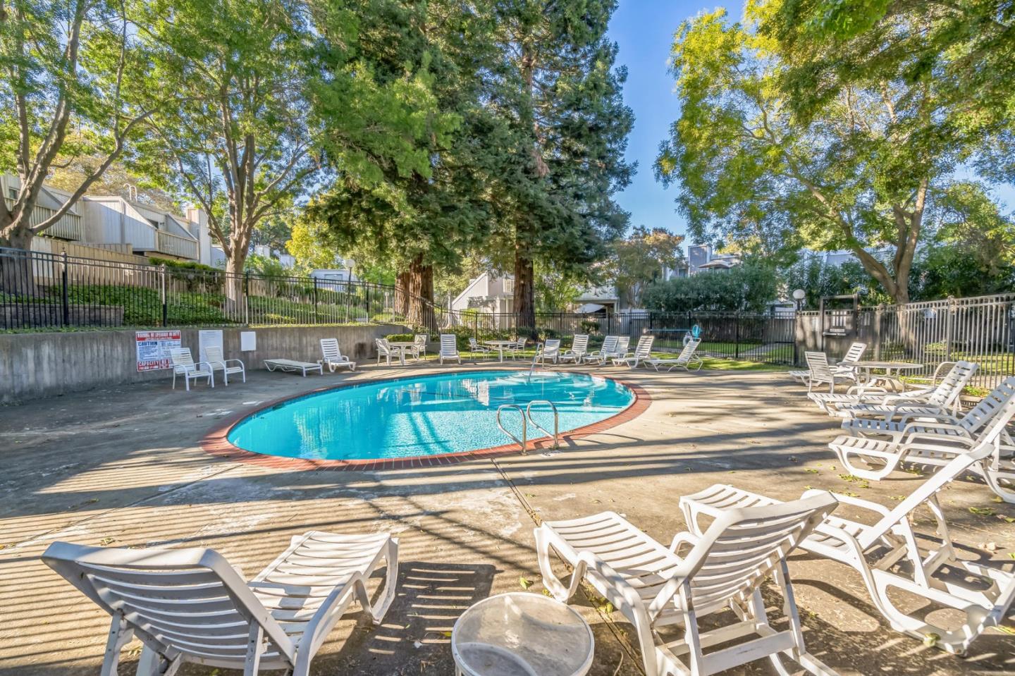 5348 Brookside Court Pleasanton, CA 94588 - Photo 27 of 30 a view of a swimming pool with a patio