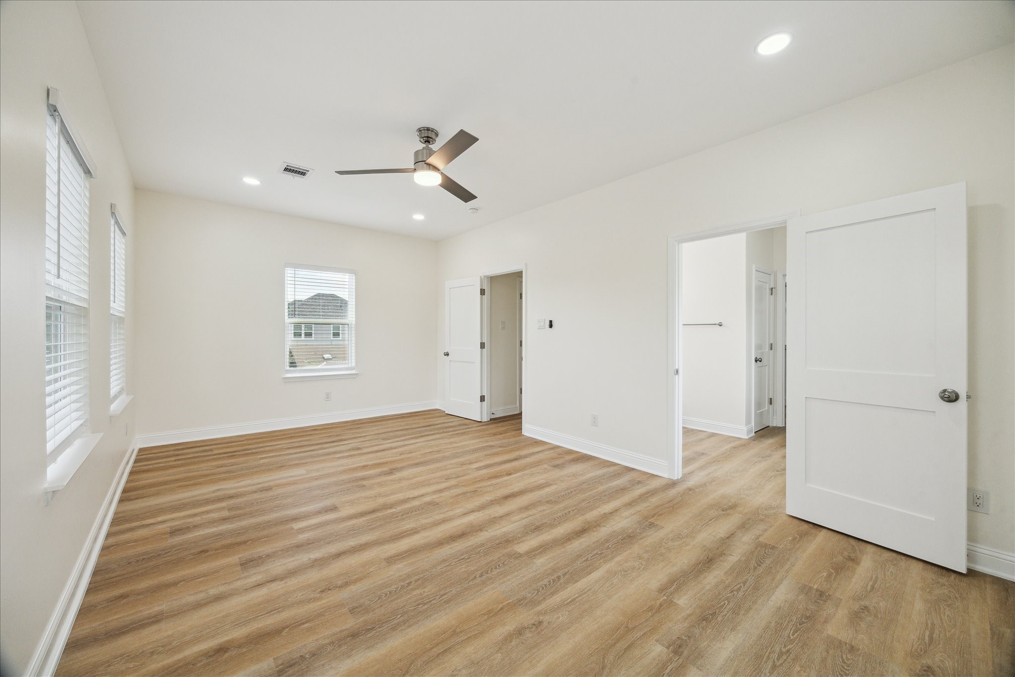 901 East 37th Street Houston, TX 77022 - Photo 8 of 19 wooden floor in an empty room with a window