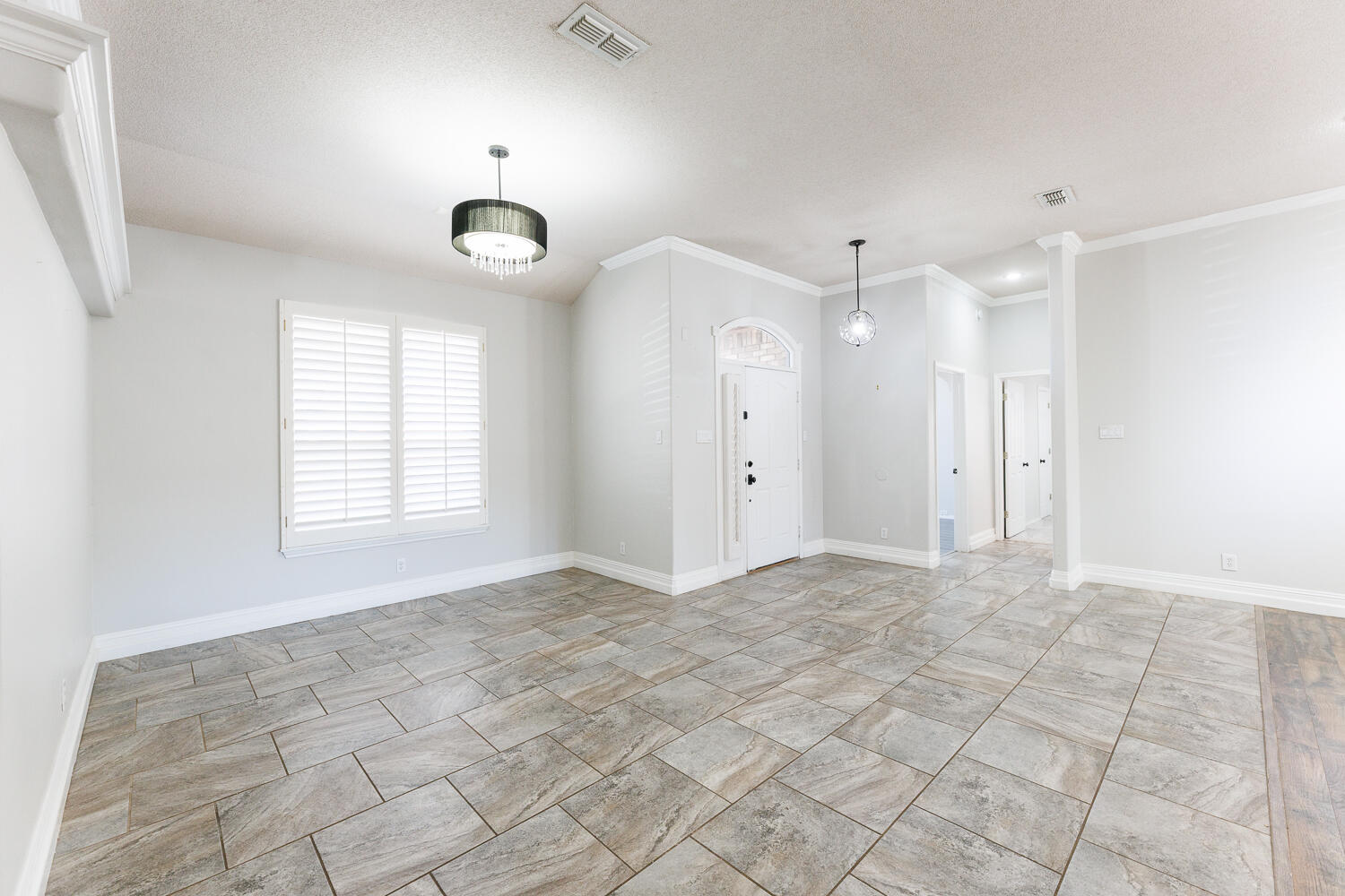 4503 108th Street Lubbock, TX 79424 - Photo 11 of 53 a view of an empty room with a window