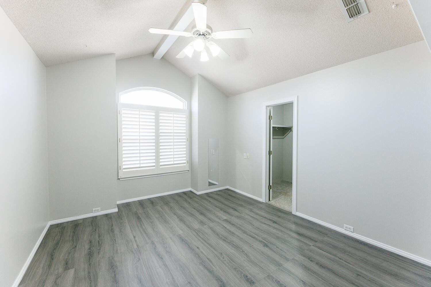 4503 108th Street Lubbock, TX 79424 - Photo 35 of 53 wooden floor in an empty room with a window