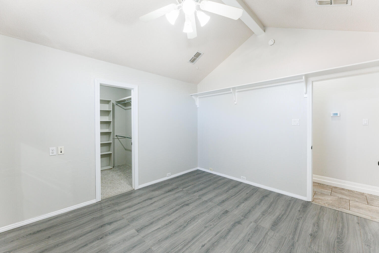 4503 108th Street Lubbock, TX 79424 - Photo 36 of 53 an empty room with wooden floor and windows