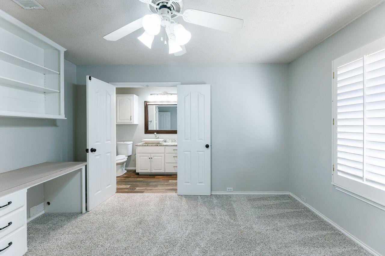 4503 108th Street Lubbock, TX 79424 - Photo 44 of 53 a view of an empty room with a window