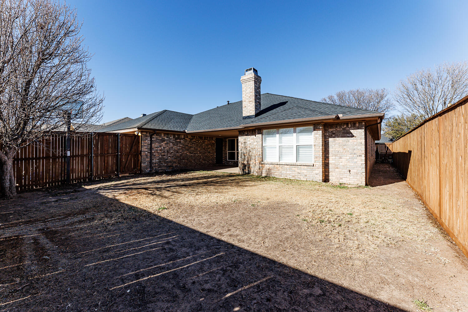 4503 108th Street Lubbock, TX 79424 - Photo 52 of 53 a front view of a house with yard
