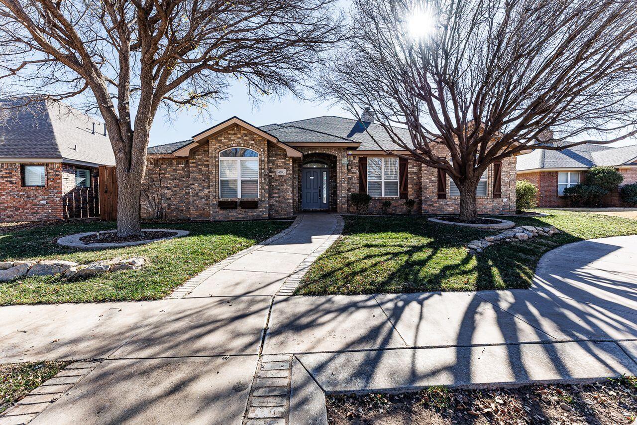 4503 108th Street Lubbock, TX 79424 - Photo 53 of 53 a front view of a house with a yard