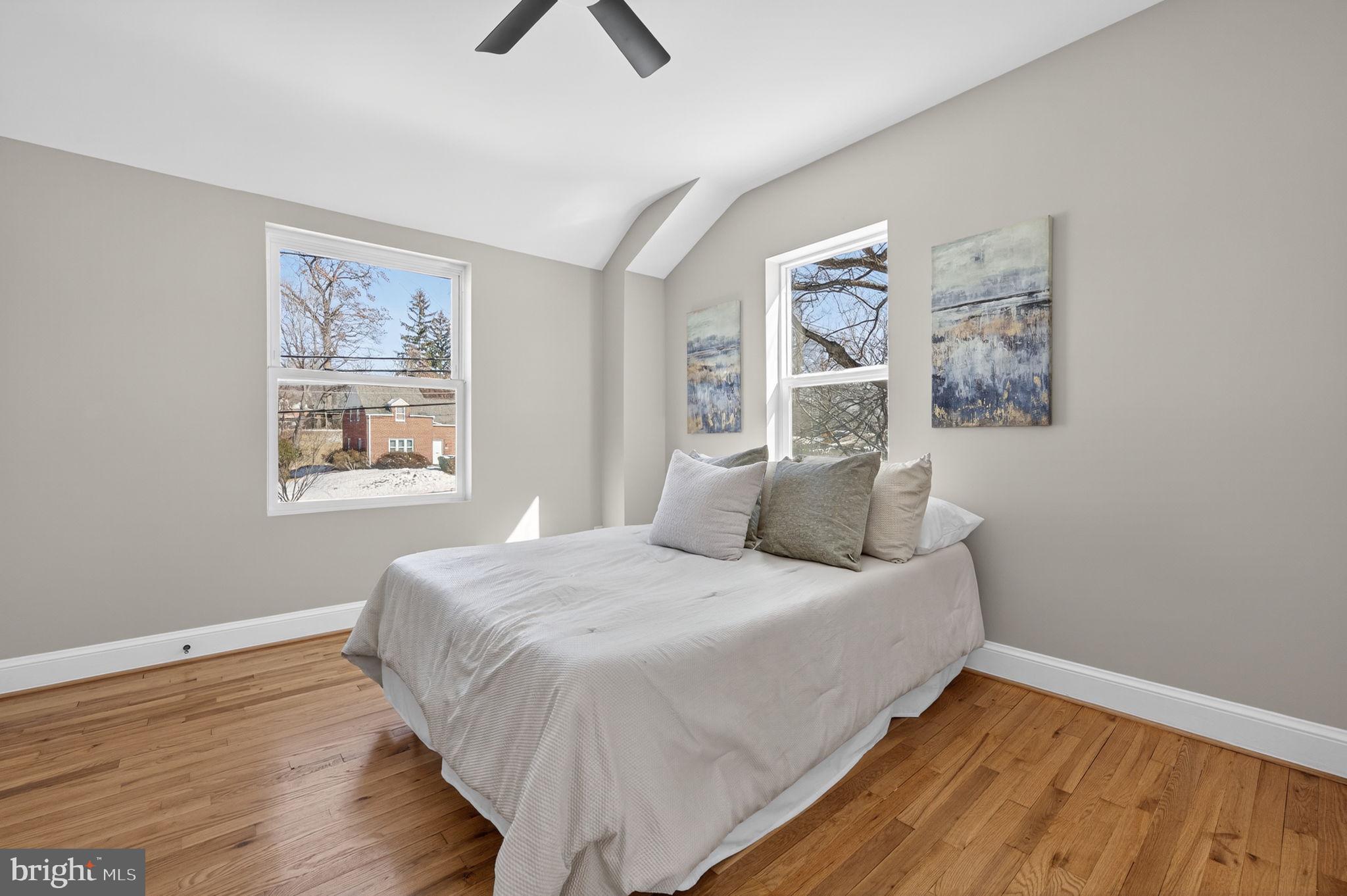 914 Dennis Avenue Silver Spring, MD 20901 - Photo 18 of 37 a bedroom with a bed and a window