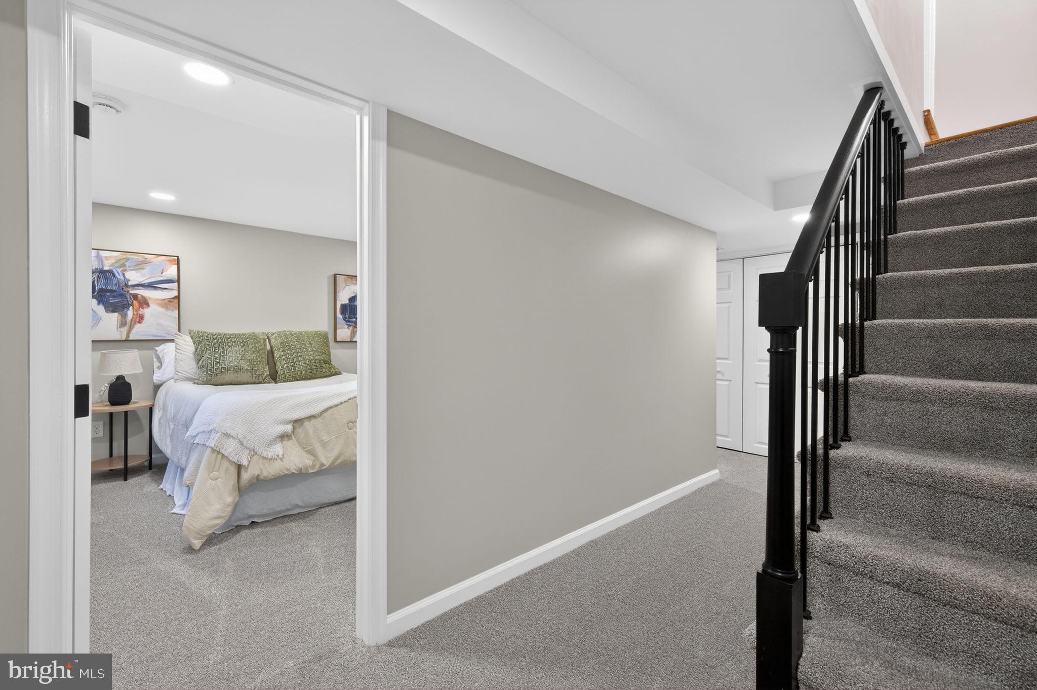 914 Dennis Avenue Silver Spring, MD 20901 - Photo 28 of 37 a bedroom with a bed and a window