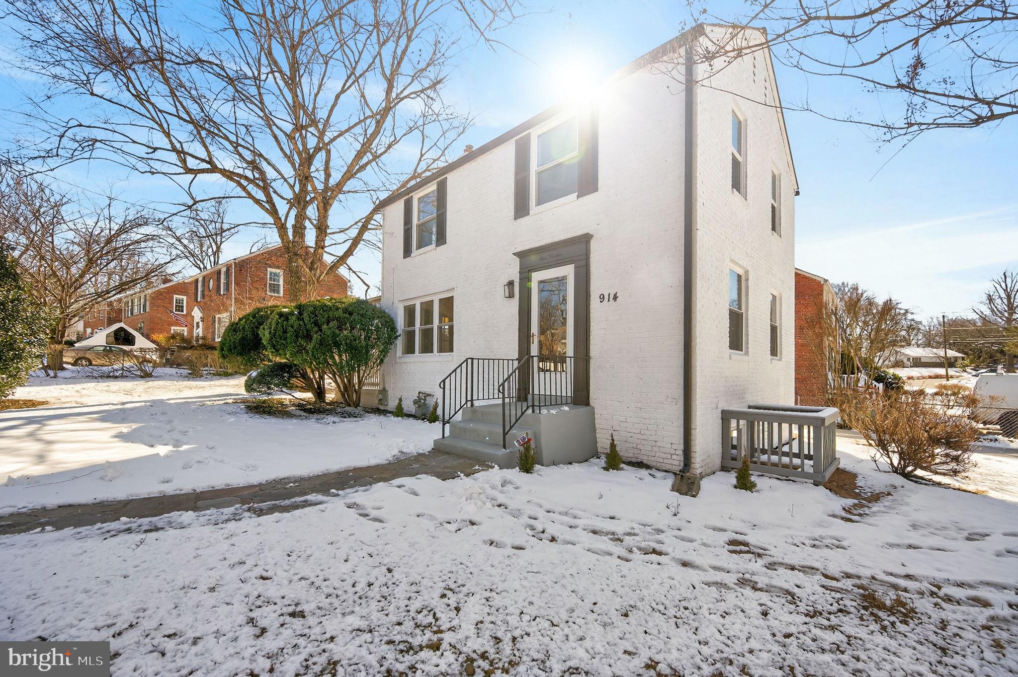 914 Dennis Avenue Silver Spring, MD 20901 - Photo 3 of 37 a view of a street with a building in the background