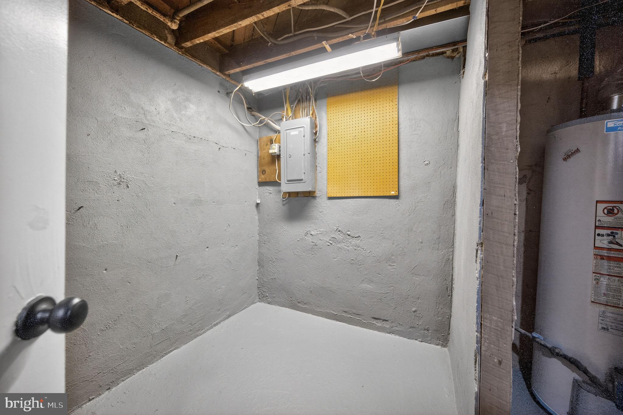 914 Dennis Avenue Silver Spring, MD 20901 - Photo 31 of 37 a bathroom with a granite countertop sink and a mirror