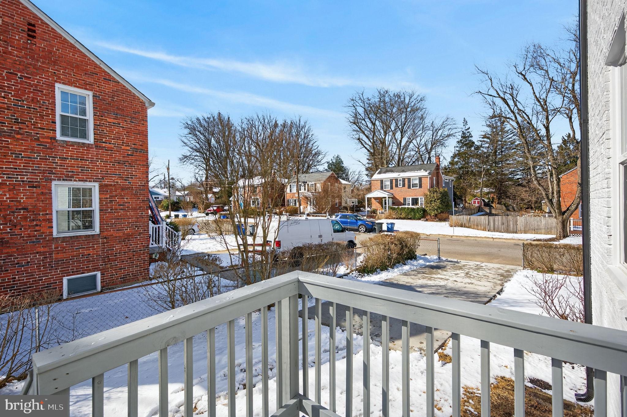 914 Dennis Avenue Silver Spring, MD 20901 - Photo 34 of 37 a view of a balcony with wooden fence