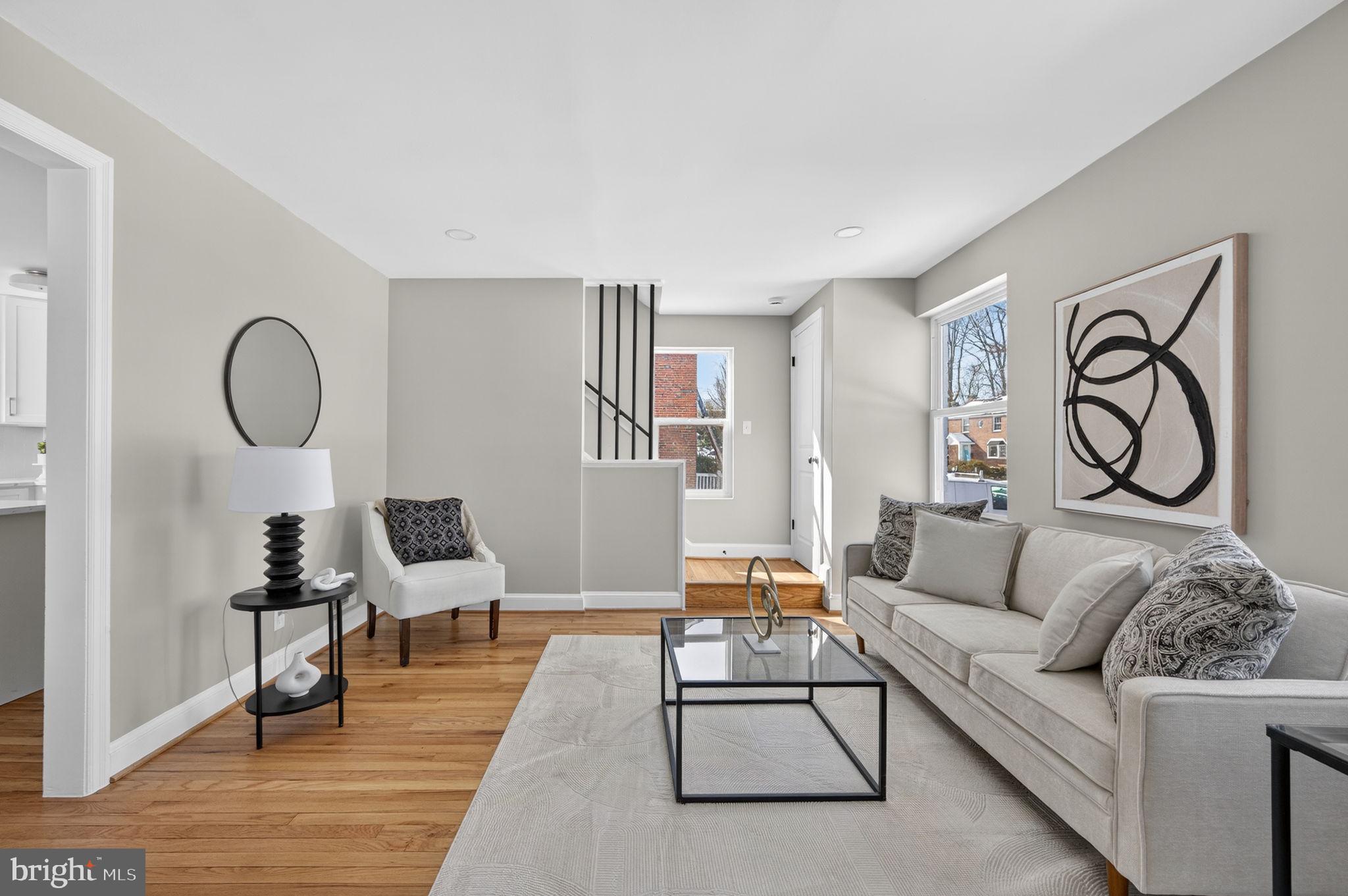 914 Dennis Avenue Silver Spring, MD 20901 - Photo 5 of 37 a living room with furniture and wooden floor