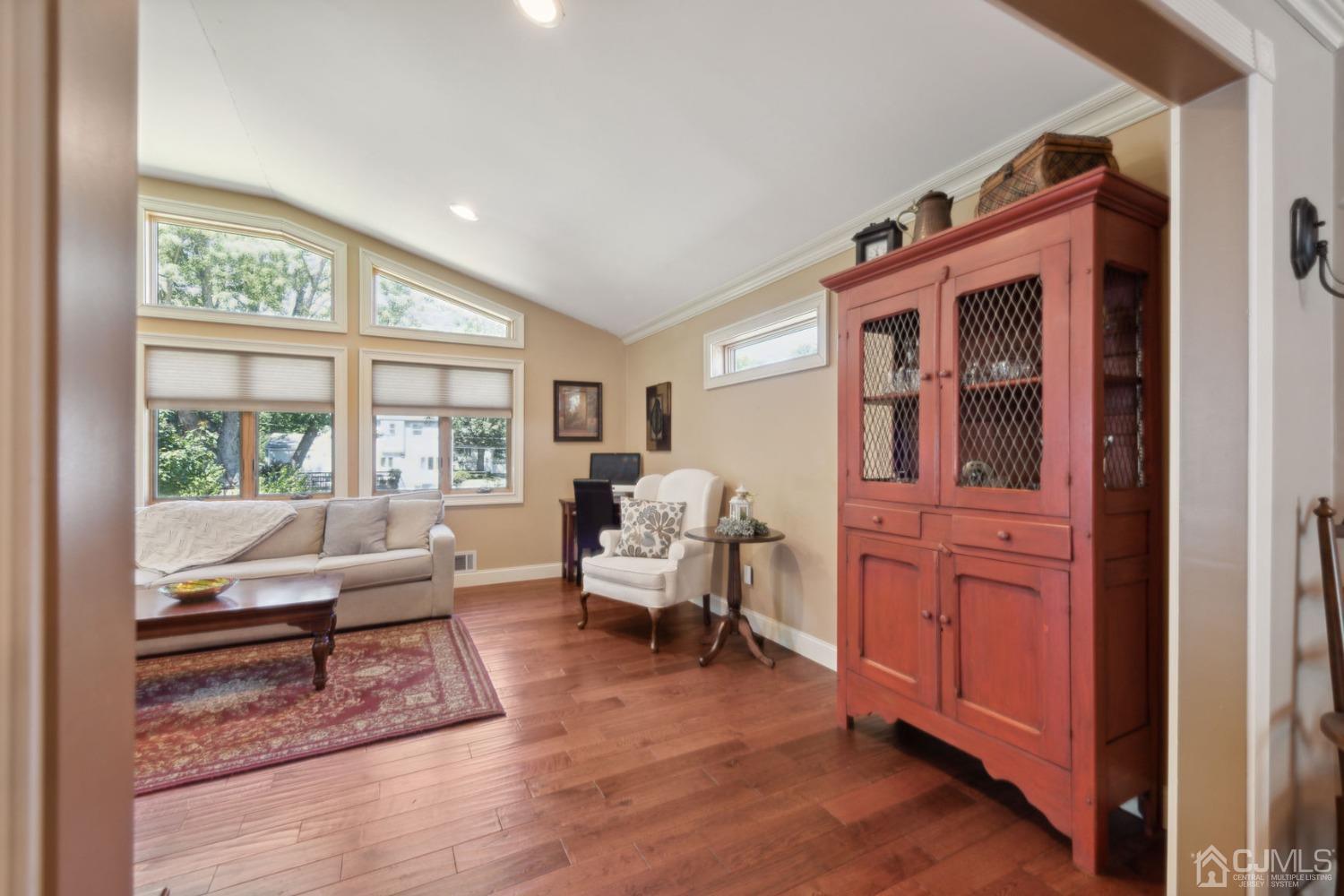 23 Kings Road East Brunswick, NJ 08816 - Photo 7 of 45 a living room with furniture and a window