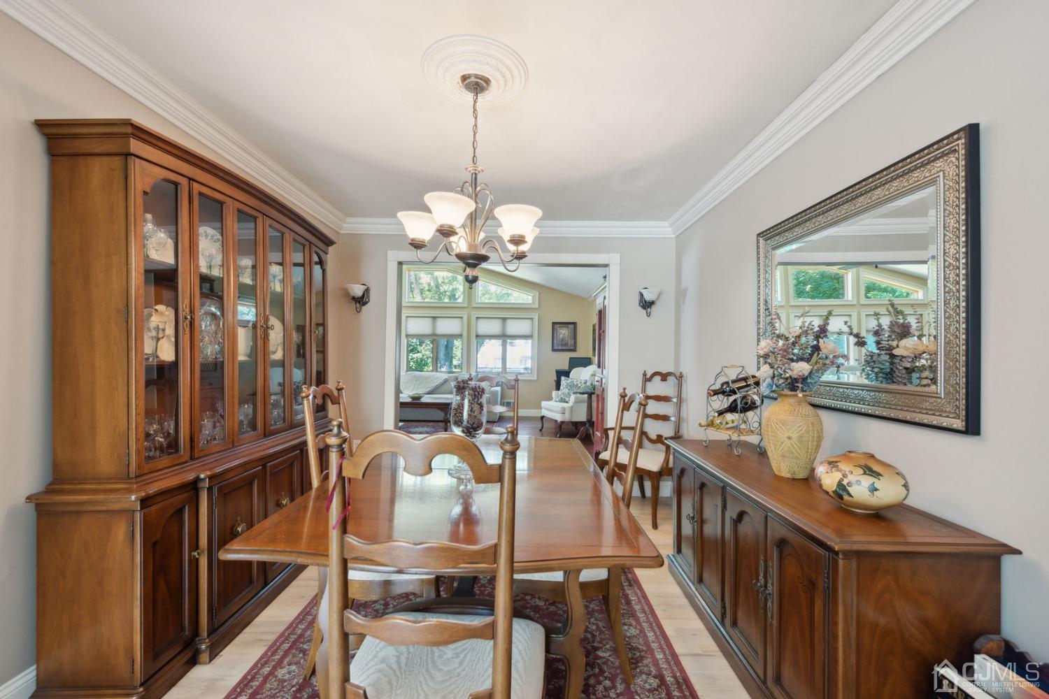 23 Kings Road East Brunswick, NJ 08816 - Photo 9 of 45 a view of a dining room with furniture window and wooden floor