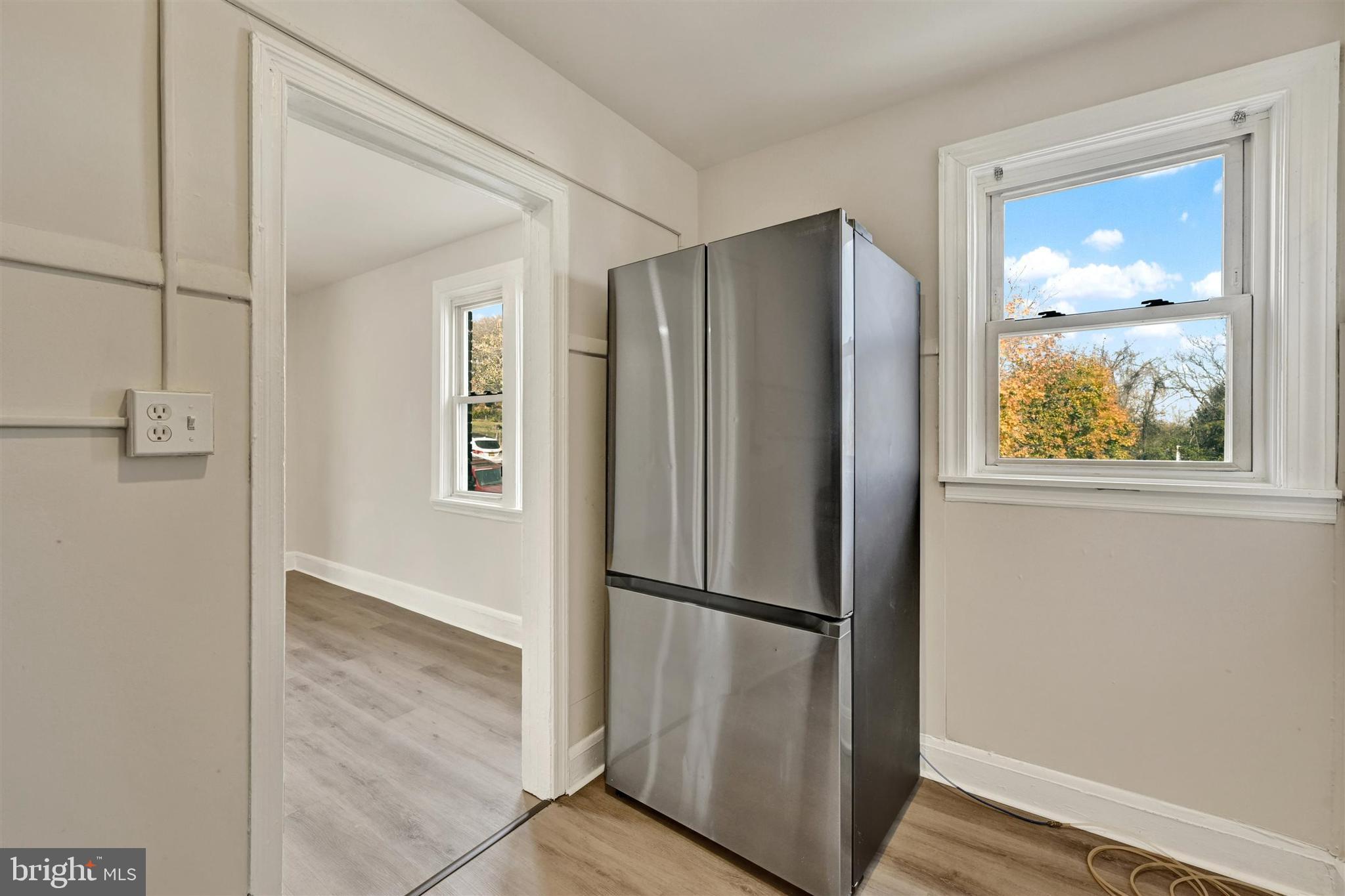 1509 Filbert Street Curtis Bay, MD 21226 - Photo 18 of 28 a view of elevator with hallway and wooden floor