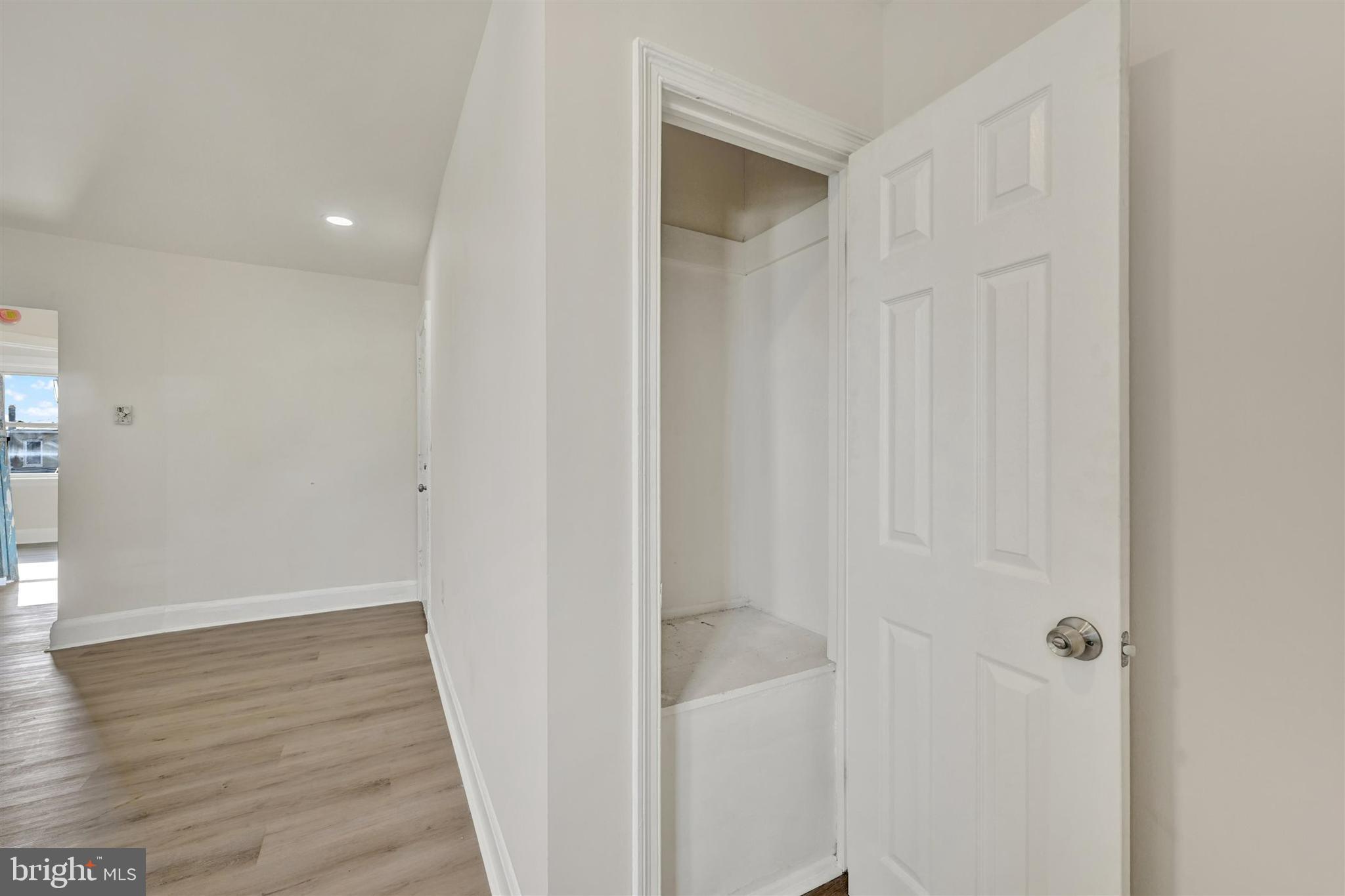 1509 Filbert Street Curtis Bay, MD 21226 - Photo 23 of 28 a view of a hallway with wooden floor