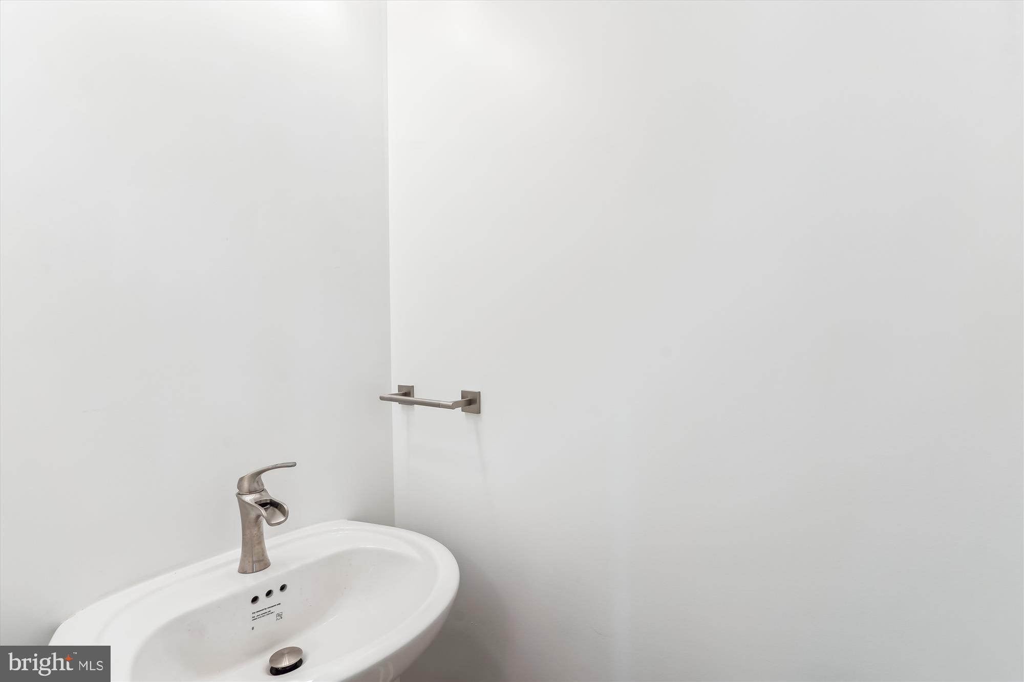 6 Ryland Chapel Road Rixeyville, VA 22737 - Photo 32 of 65 a bathroom with a sink and mirror