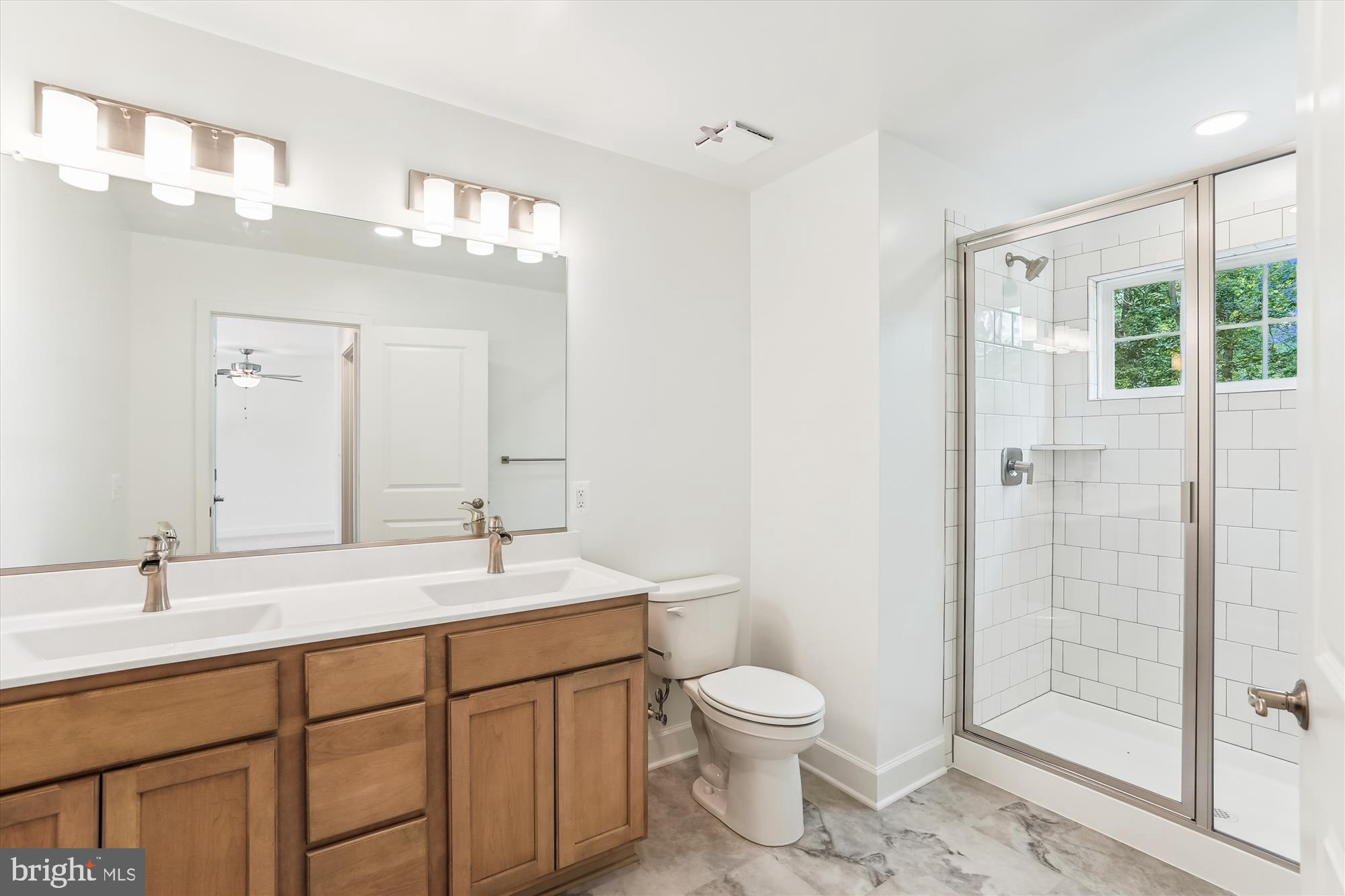 6 Ryland Chapel Road Rixeyville, VA 22737 - Photo 49 of 65 a bathroom with a sink a toilet and shower