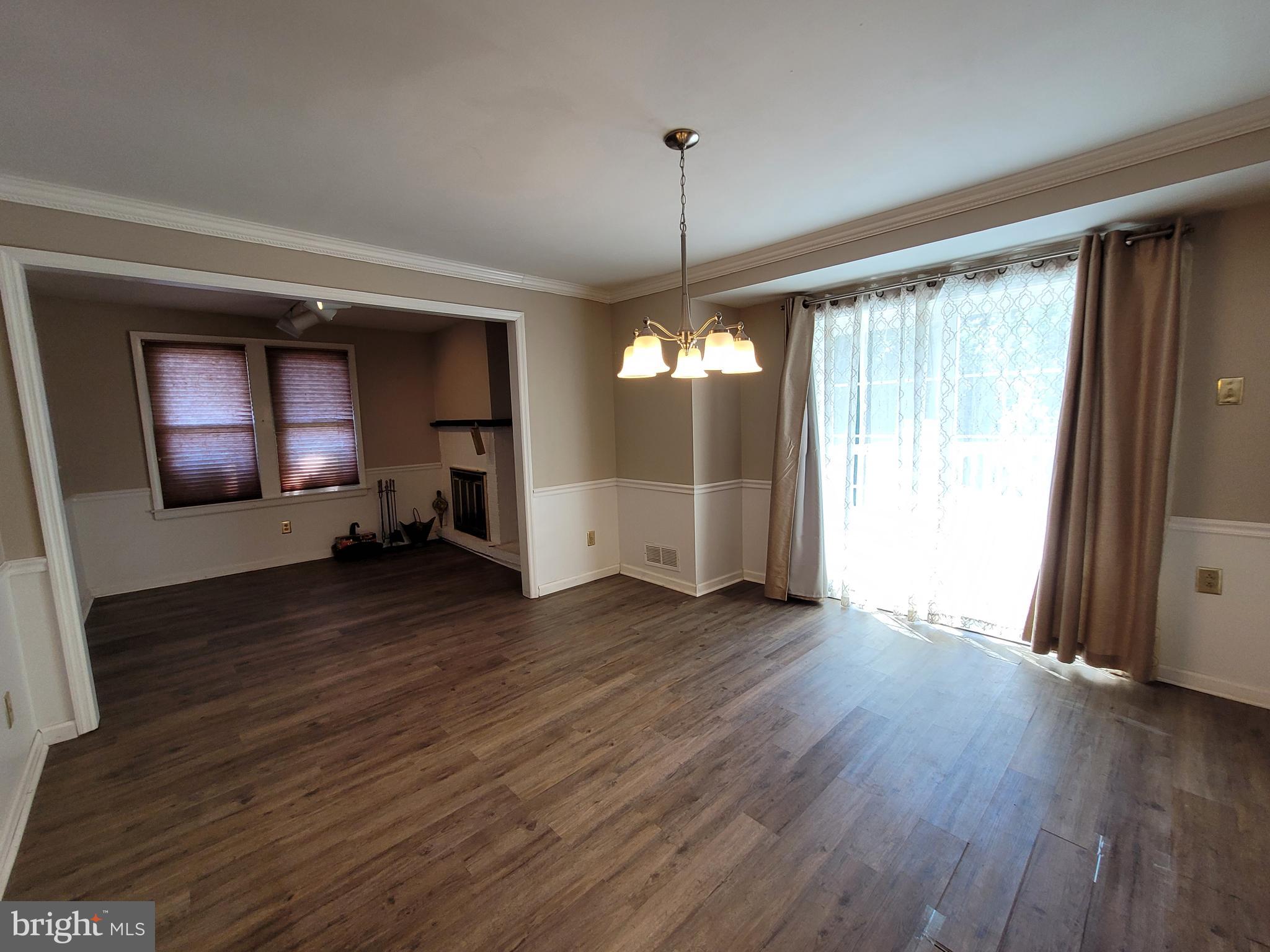 141 East Mill Road Maple Shade, NJ 08052 - Photo 6 of 22 View of dining rm and sitting with wood fireplace