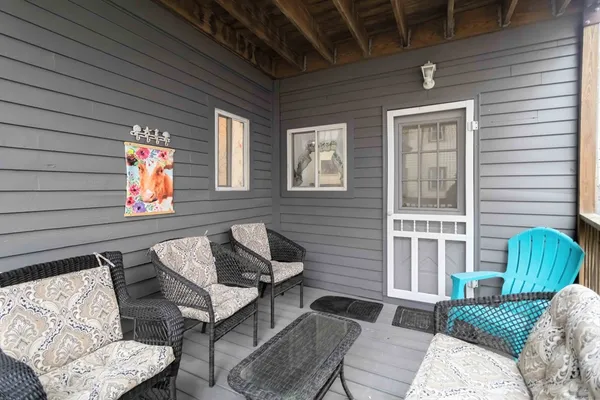 a outdoor living space with furniture and a window