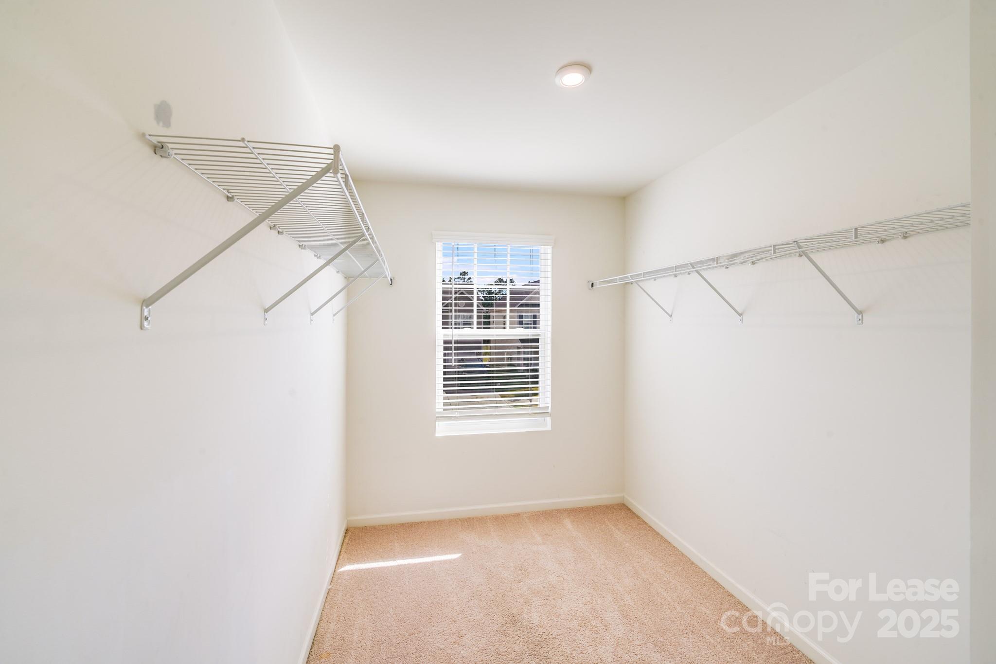 12915 Hill Pine Road Midland, NC 28107 - Photo 24 of 31 a view of an empty room with a window